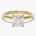 bague solitaire princesse   en or , diamant
