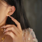 boucle d'oreille en or
