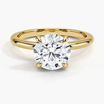 bague solitaire  en or , diamant
