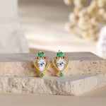 boucle d'oreille en or sertie diamants moissanite