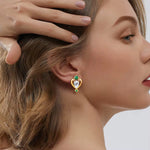 boucle d'oreille en or sertie diamants moissanite